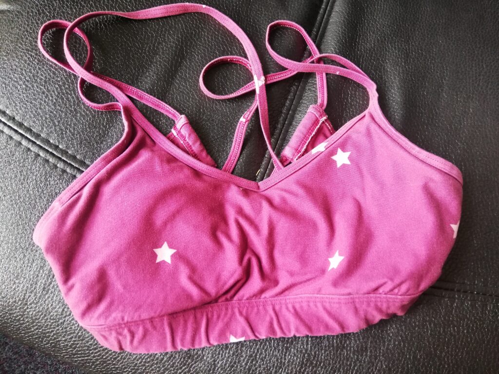 Pink with light pink stars sports bra
