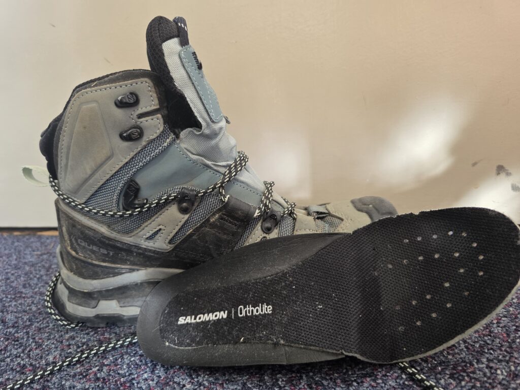 Solomon hiking boot with insole out
