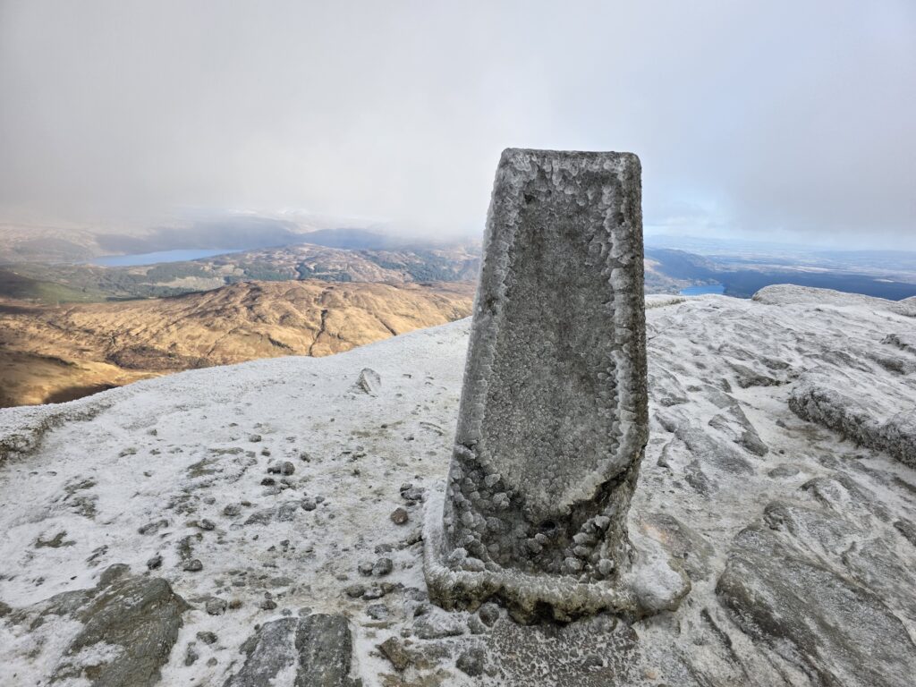 Trig point on the summit of Ben Lomond