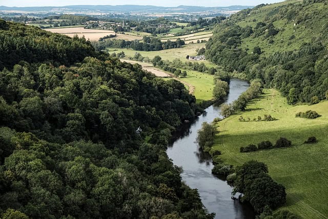 Wye Valley landscape with river and trees on the hills